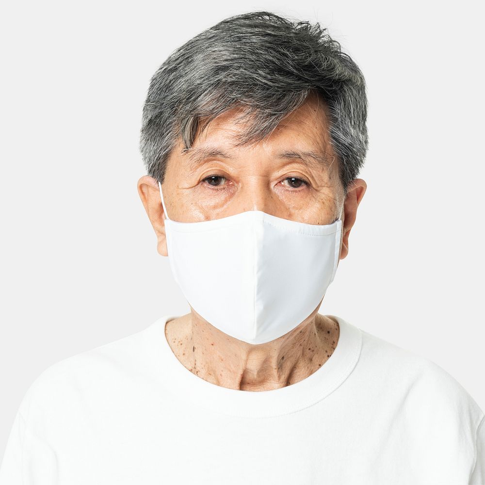 Senior man wearing white face mask covid-19 campaign with design space