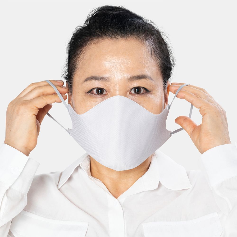 Senior woman wearing white face mask covid-19 campaign with design space