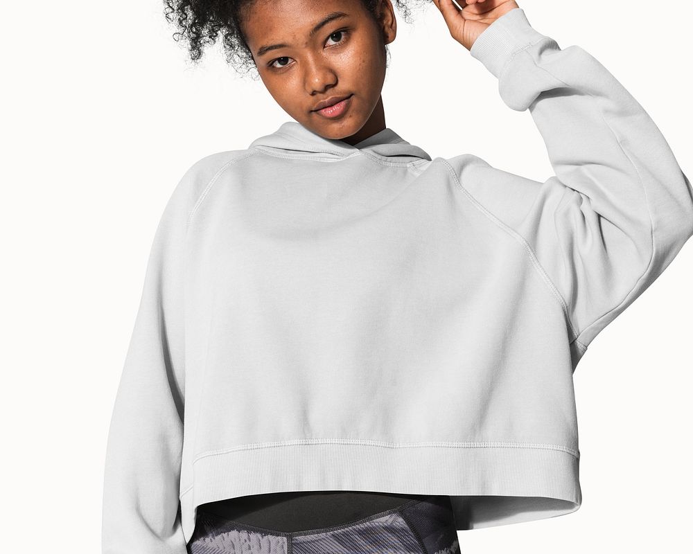 Teenage girl in gray hoodie for street fashion photoshoot