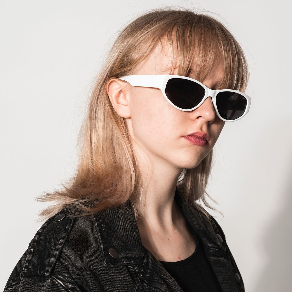 Blonde girl with white sunglasses teen&rsquo;s fashion photoshoot