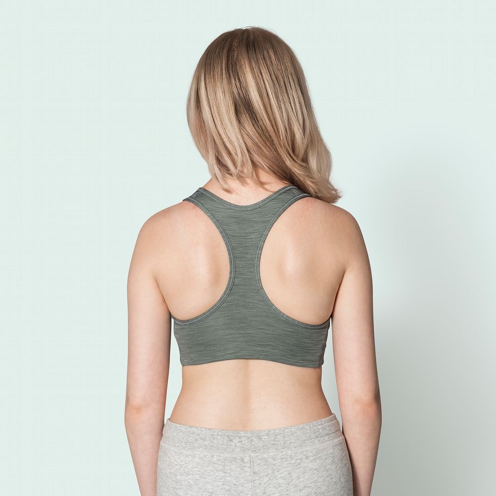 Blonde girl in gray sports bra for activewear photoshoot