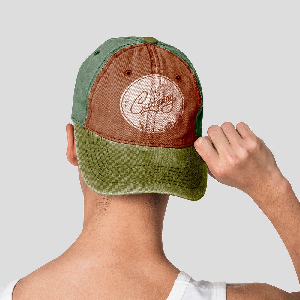 Brownish green cap psd mockup with Camping typography streetwear shoot
