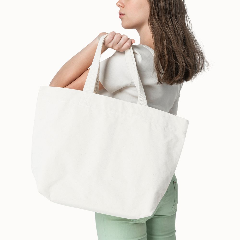 Woman with white tote bag