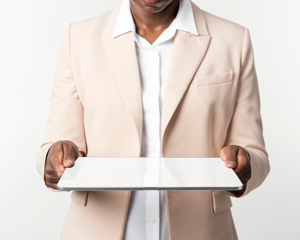 Business woman holding a digital tablet