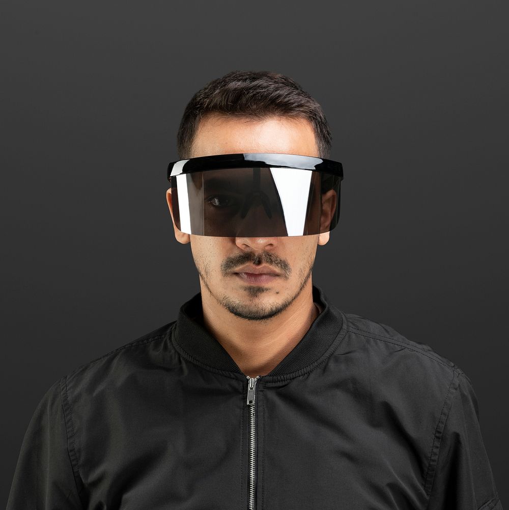 Man wearing black shield glasses