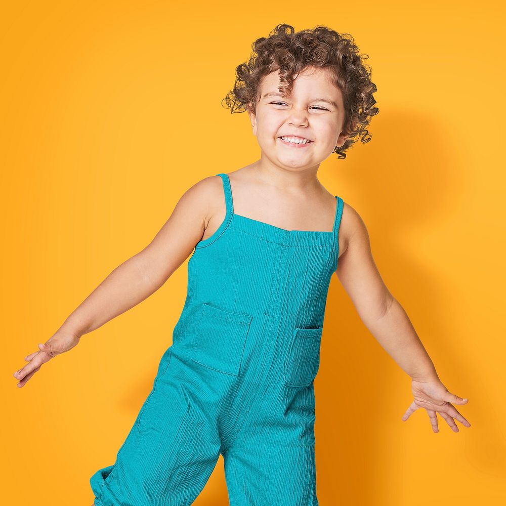 Psd girl's teal sleeveless jumpsuit mockup