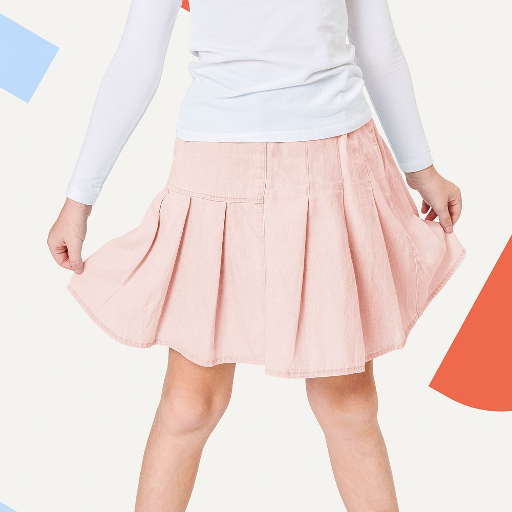 Woman wearing pink skirt in studio