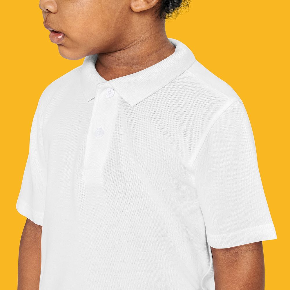 Black boy wearing white polo t shirt studio shot