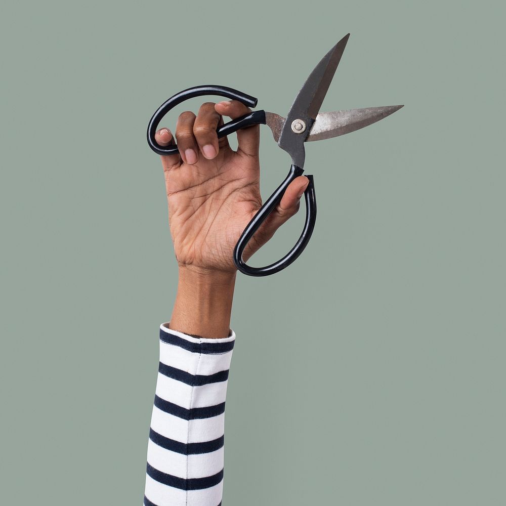 Hand mockup psd holding garden scissors gardening tool