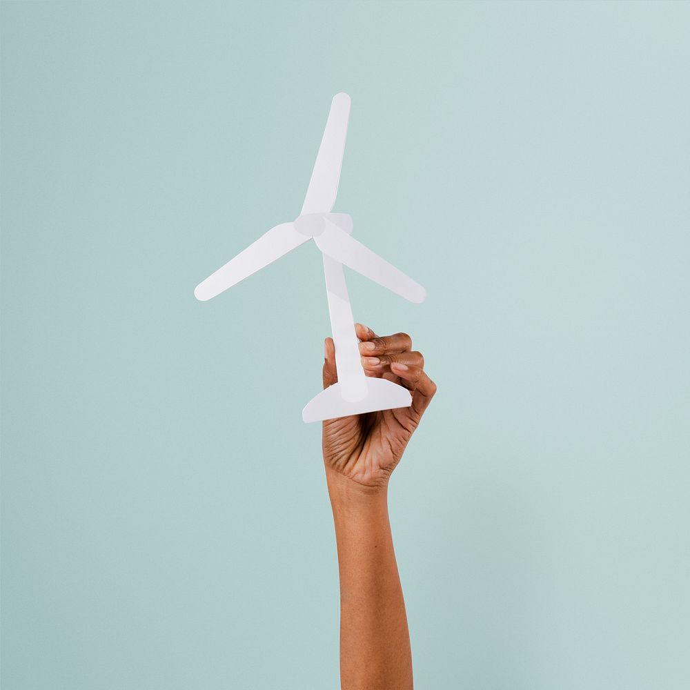 Wind turbine hand mockup psd renewable energy environment