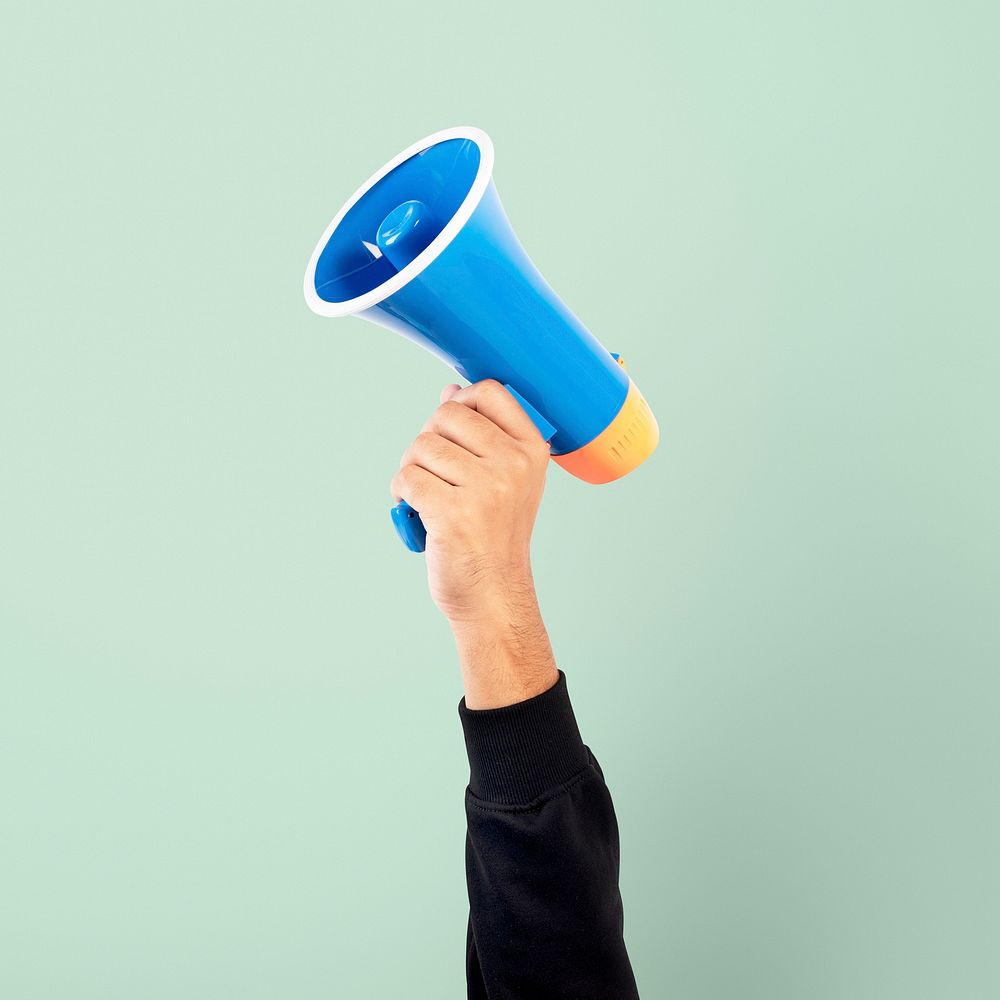 Hand holding megaphone mockup psd marketing announcement campaign