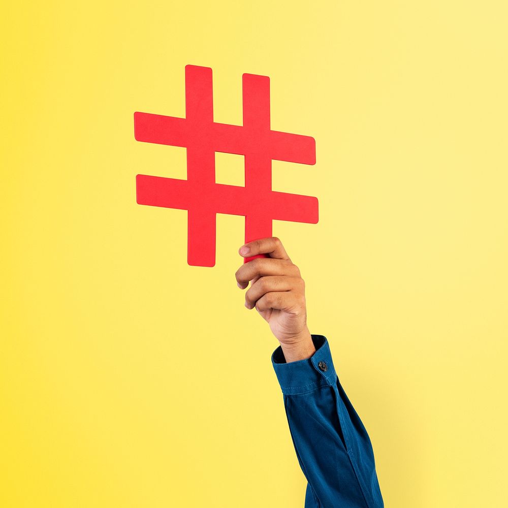 Hand holding hashtag mockup psd marketing trending concept
