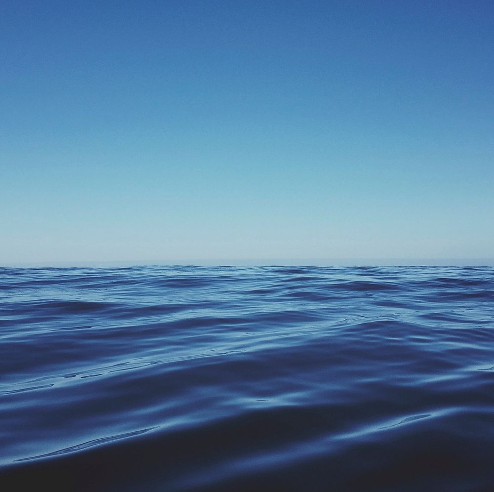 Blue sea and blue sky. Original public domain image from Wikimedia Commons