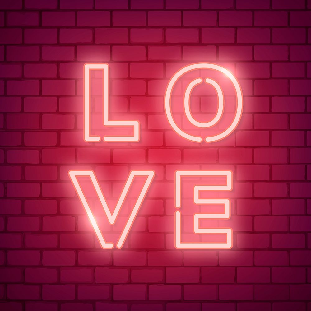 Neon light love word on brick wall