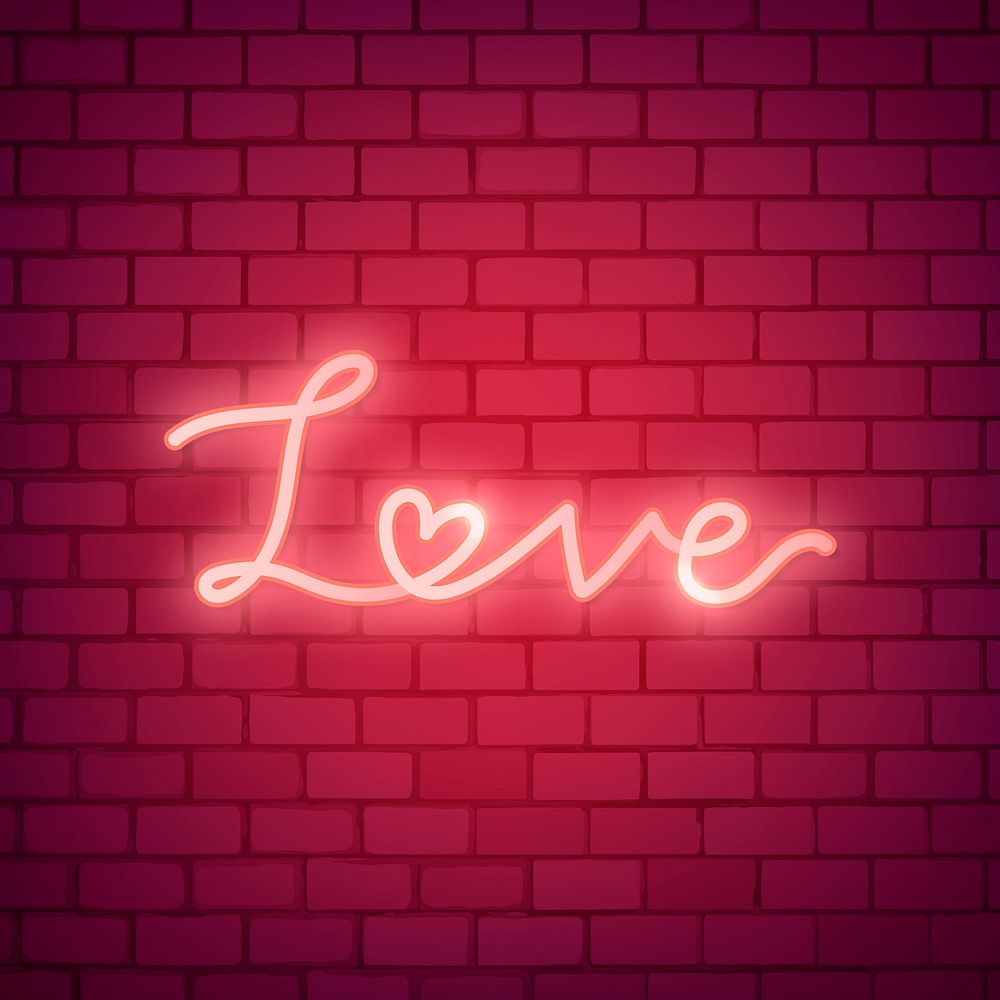 Neon light love word on brick wall