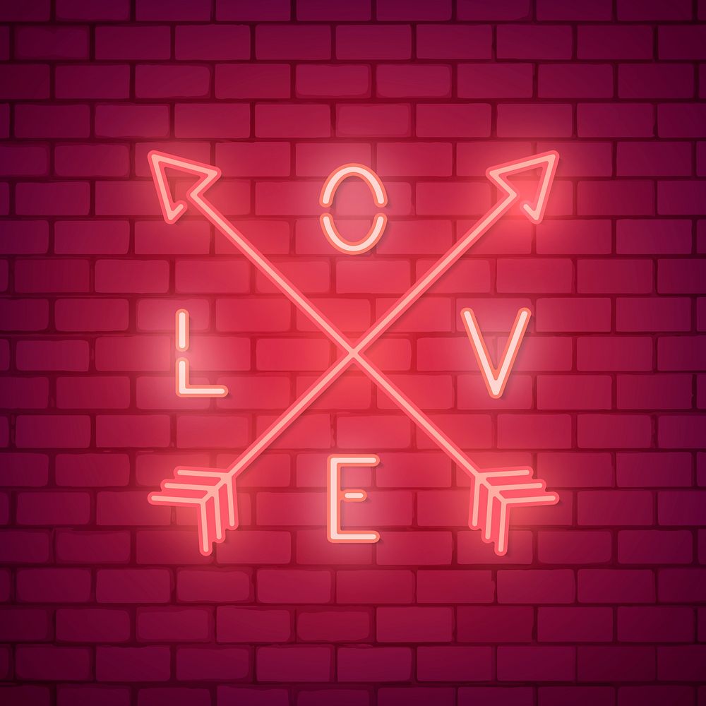 Neon light love word on brick wall