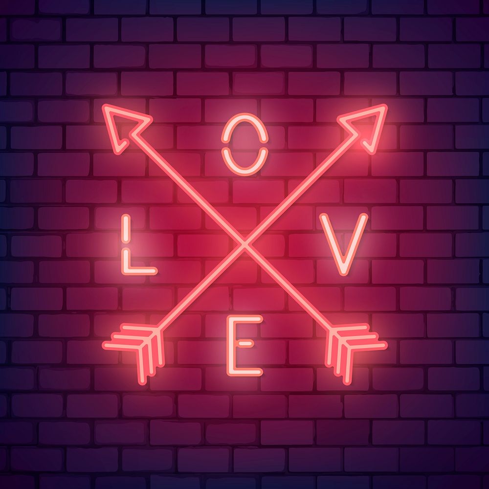 Neon light love word on brick wall