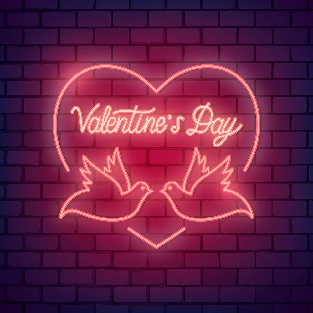 Neon light Valentine's day symbol on brick wall