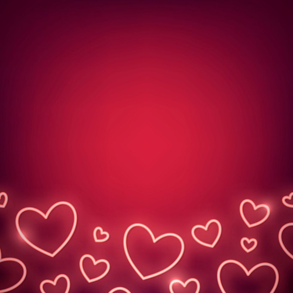 Neon light heart on red background