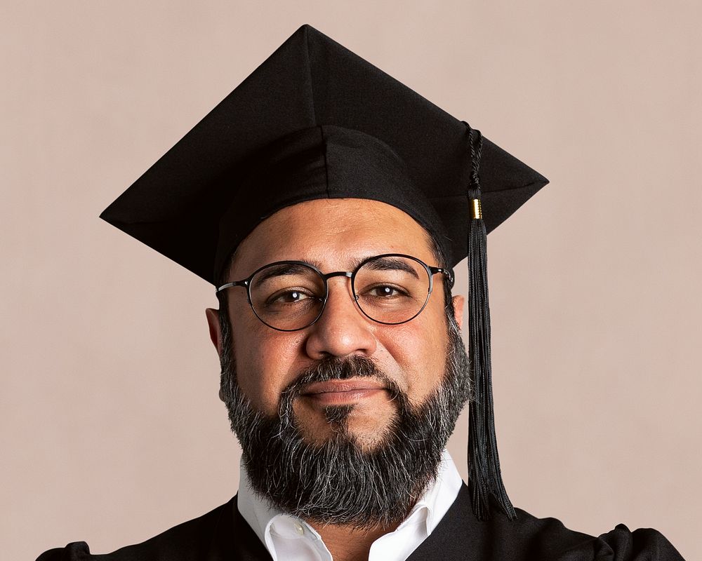 Senior man wearing regalia, smiling face portrait psd