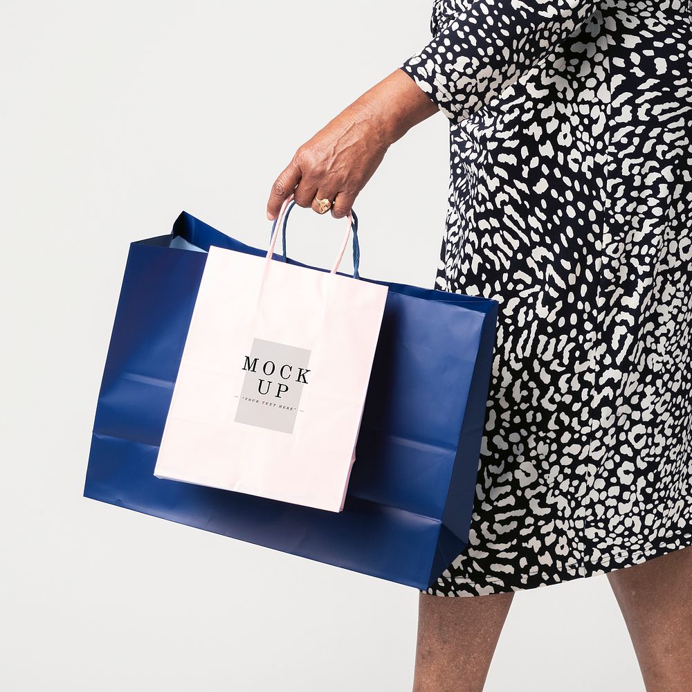 Black woman carrying shopping bag mockups 