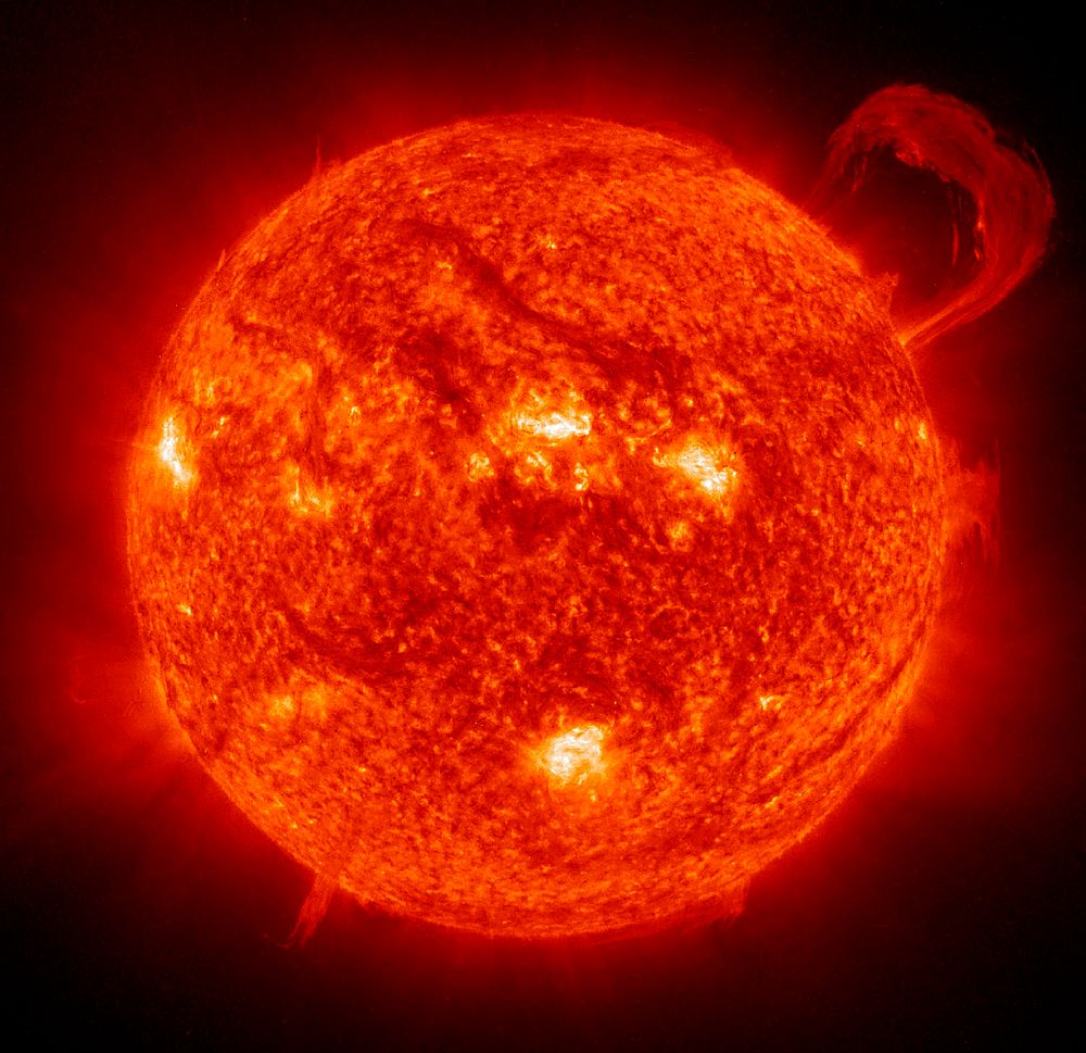 Prominences are huge clouds of relatively cool dense plasma suspended in the Sun's hot, thin corona. Original from NASA.…