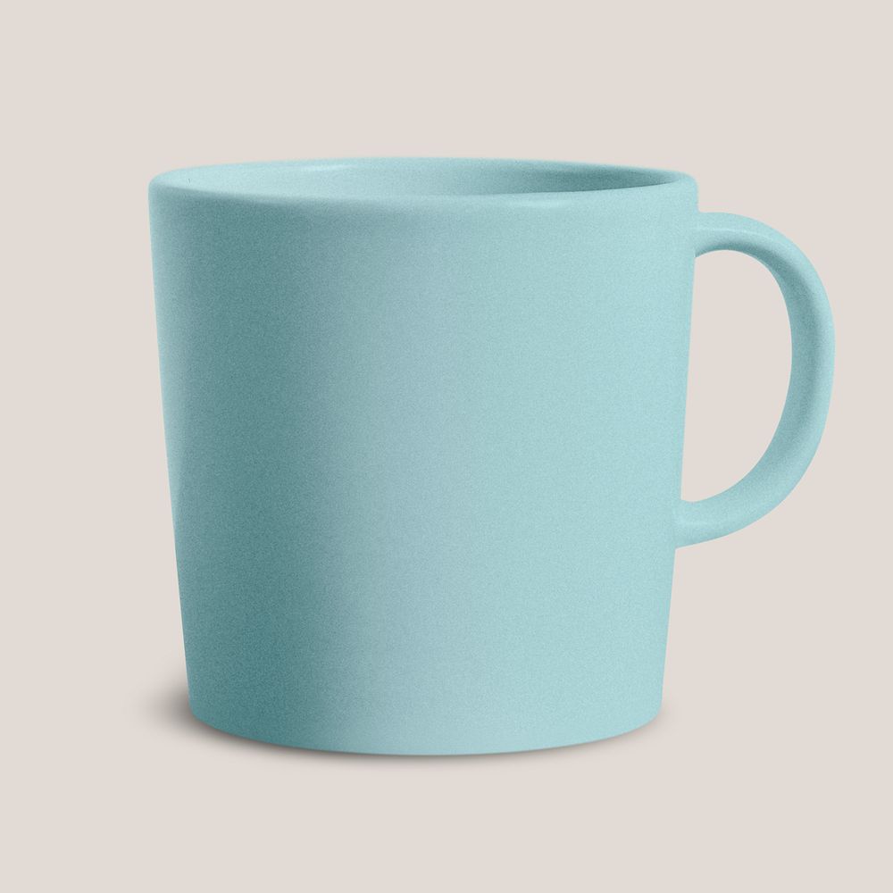 Blue ceramic coffee cup on beige background