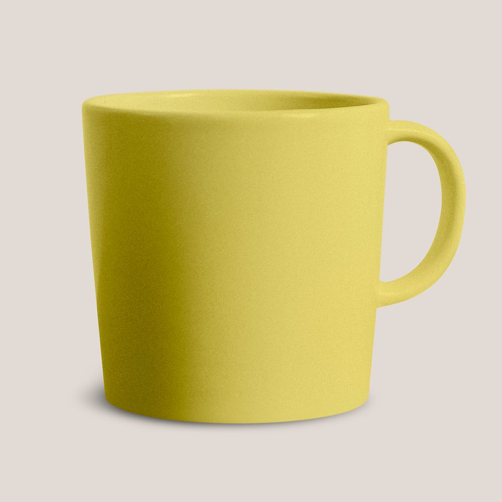 Yellow ceramic coffee cup on beige background