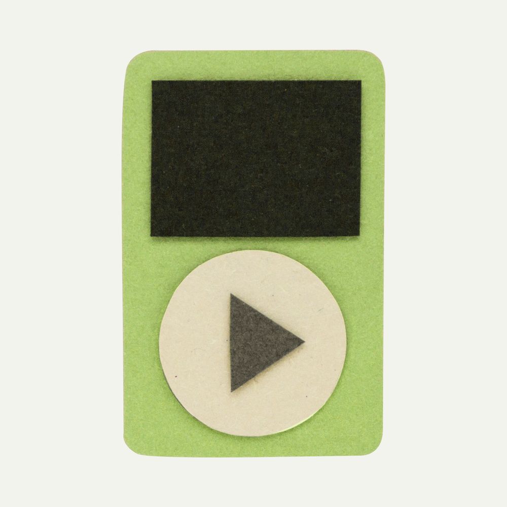 Green music player paper craft on off white background