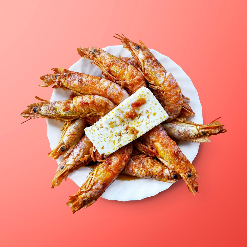 Cooked prawn on a plate, seafood on red background, food photography