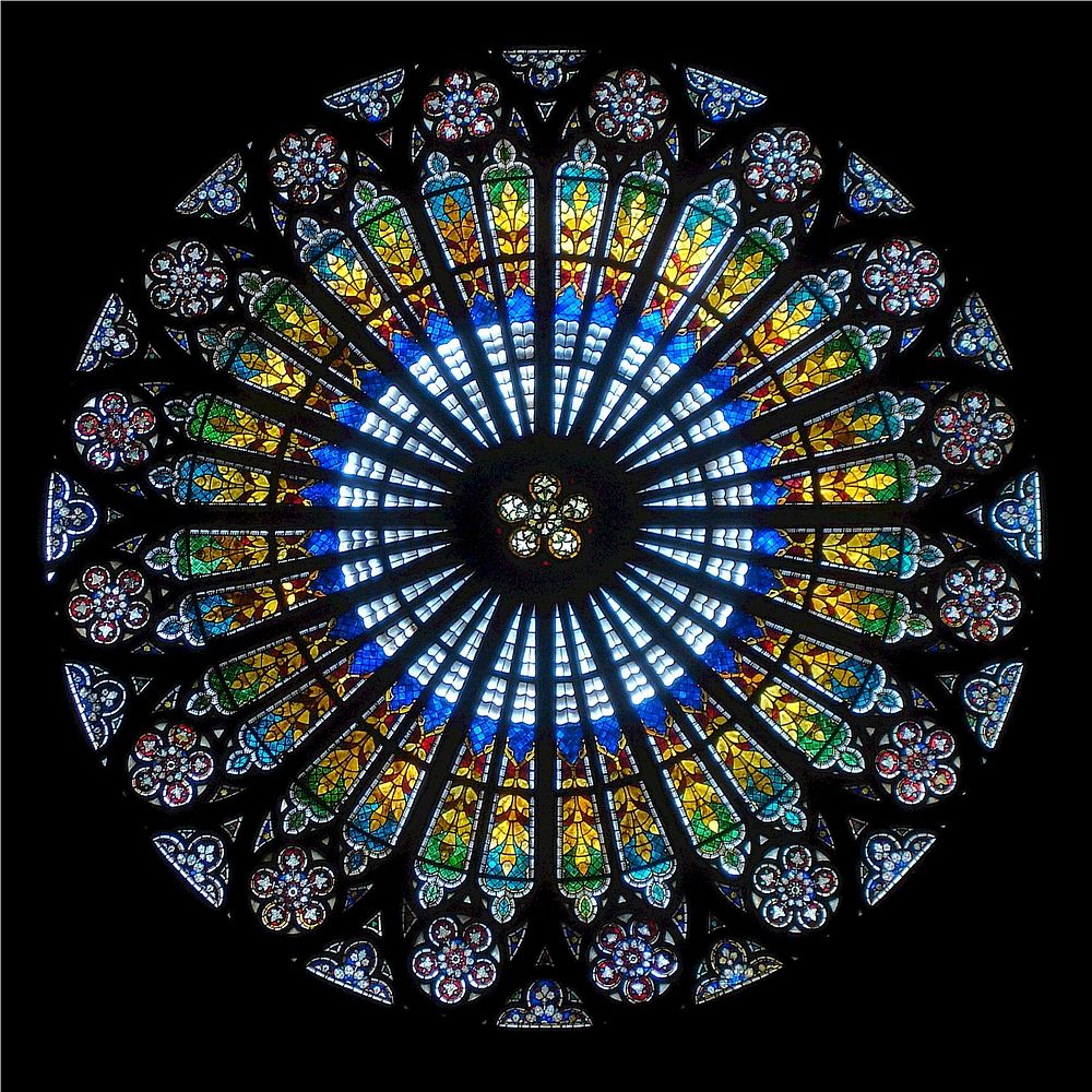 Rose window at Cath&eacute;drale Notre-Dame de Strasbourg. Free public domain CC0 photo.
