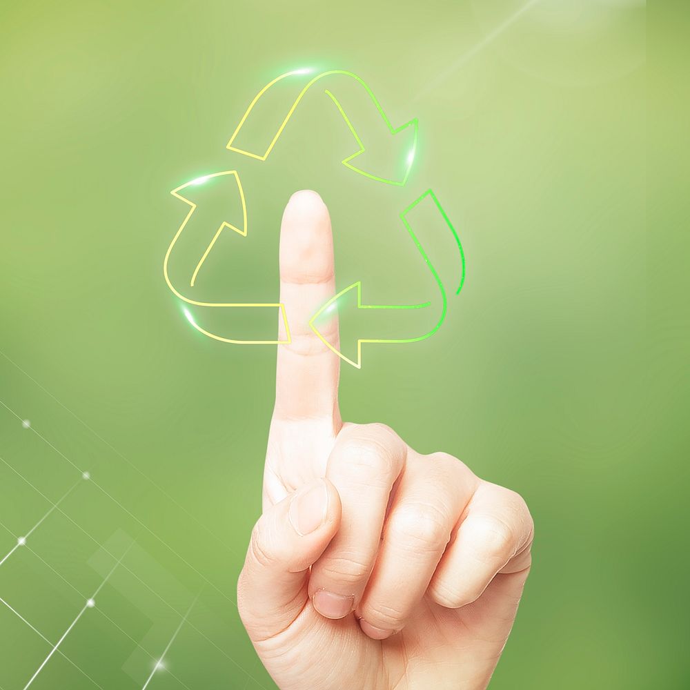 Sustainable technology, green background, hand pressing recycle symbol