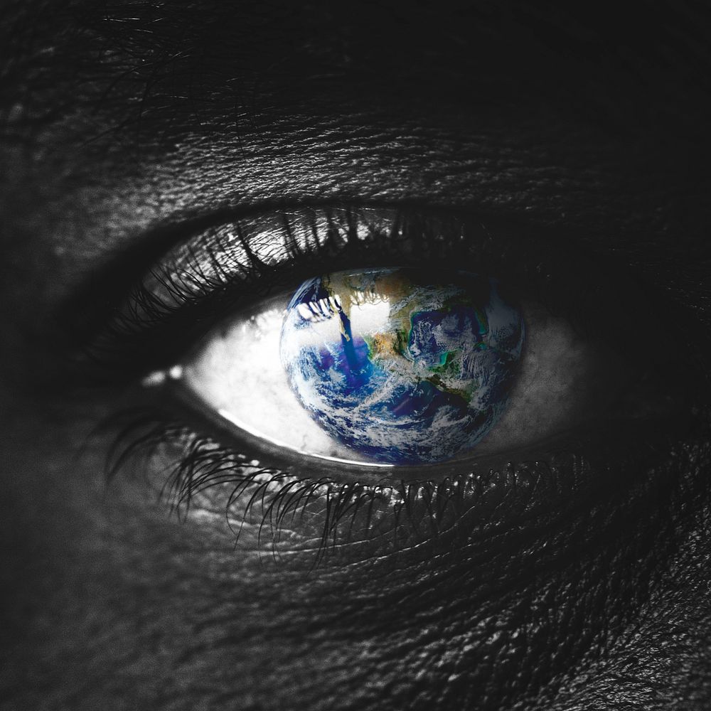 Woman with a globe in her eye, save the world background