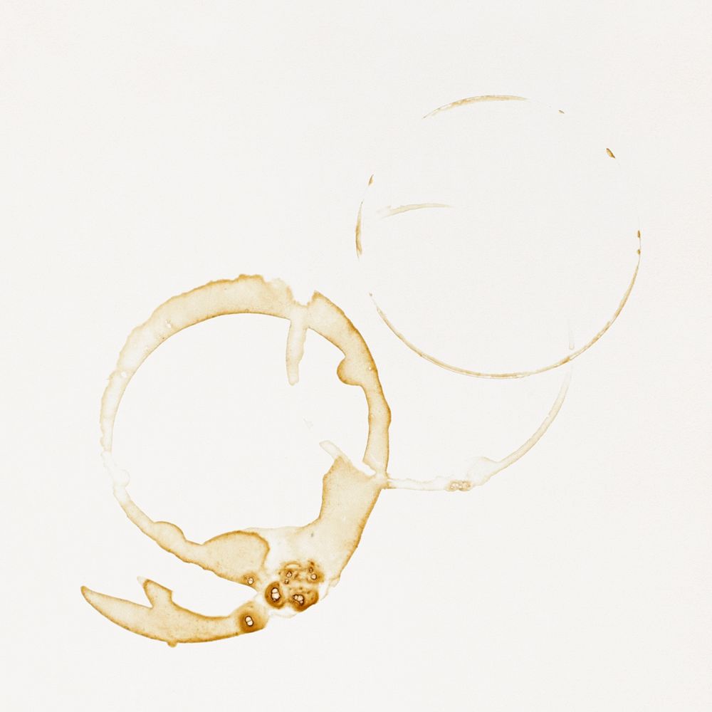 Coffee stains on beige background