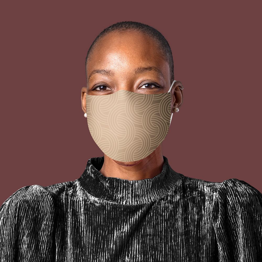 Woman wearing mask face closeup Covid-19 photoshoot on brown background