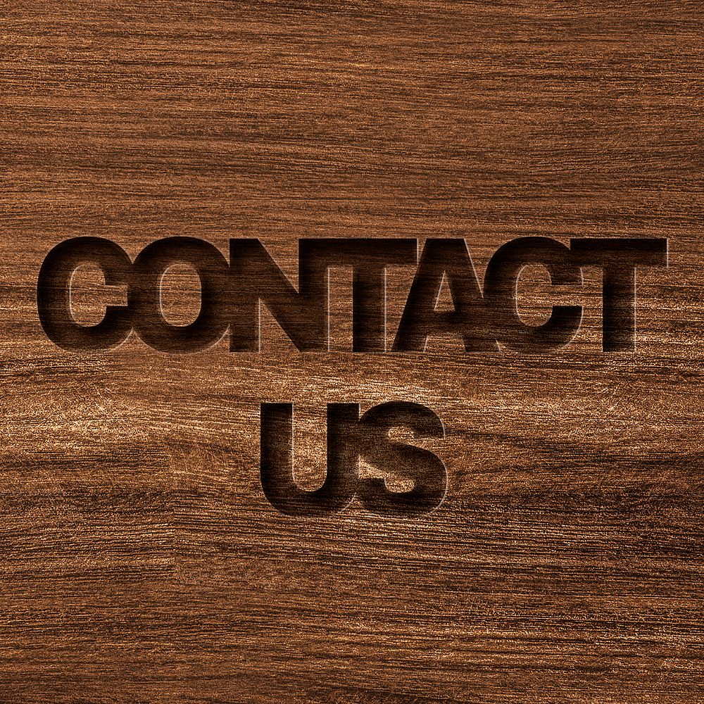 Contact us engraved wood typography on wooden background