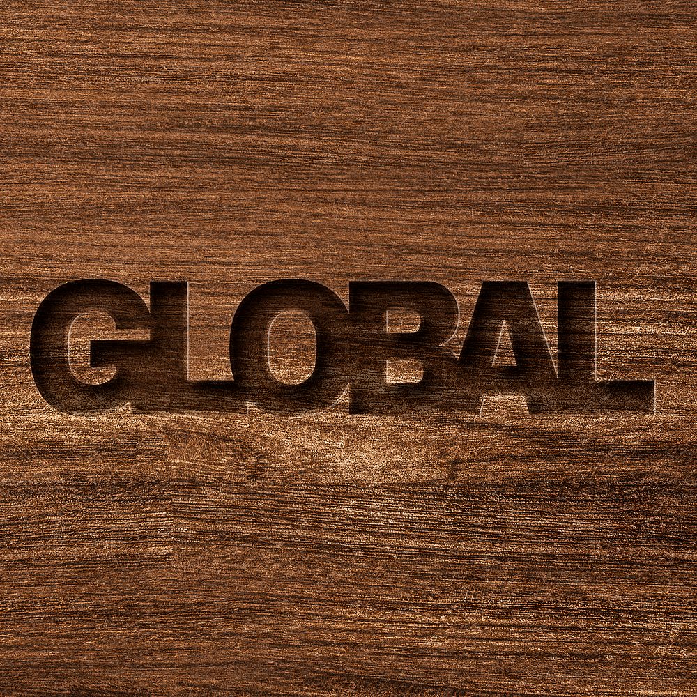 Global engraved wood typography on wooden background