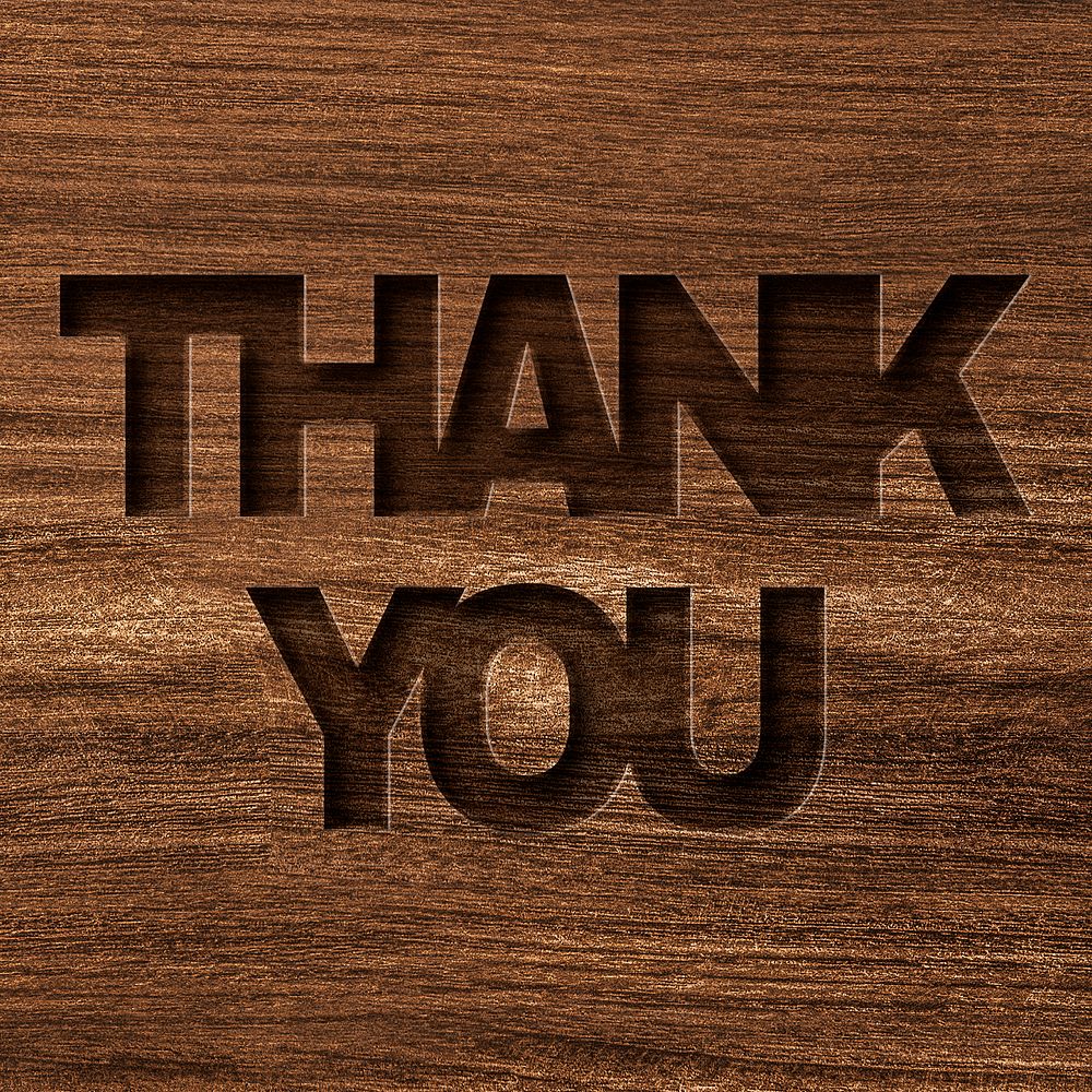 Thank you engraved wood typography on wooden background