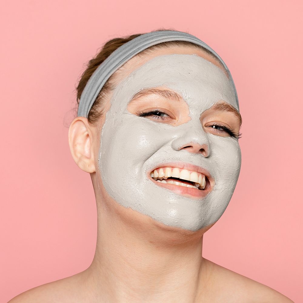 Clay mask on woman, spa facial treatment psd