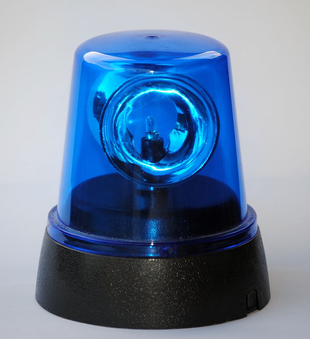 A blue flashing light. Original public domain image from Wikimedia Commons