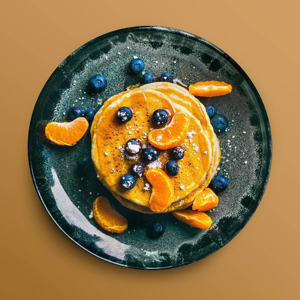Pancake with fruit on a plate, food photography psd
