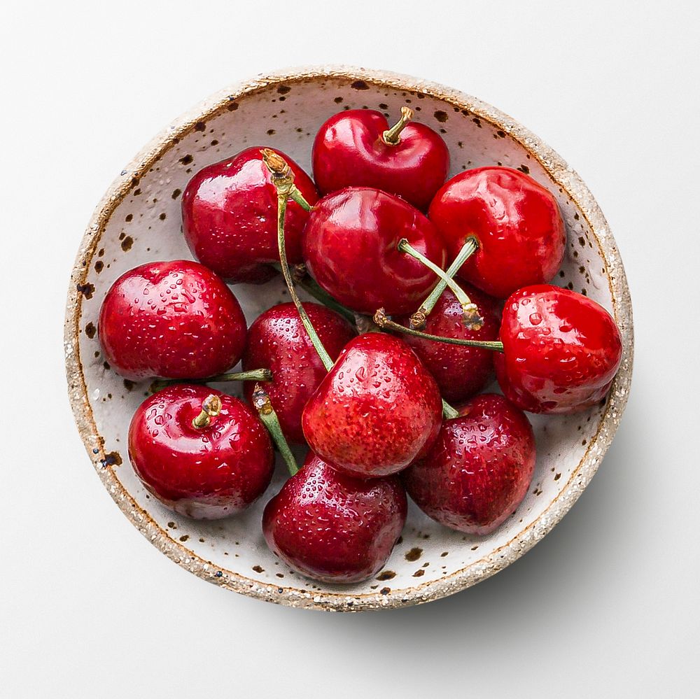Cherries on a plate, fruit on white background, food photography