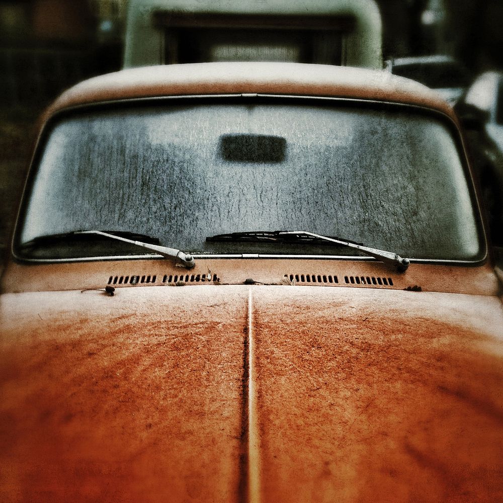 Frost-covered hood and windshield of an orange Volkswagen Beetle. Original public domain image from Wikimedia Commons