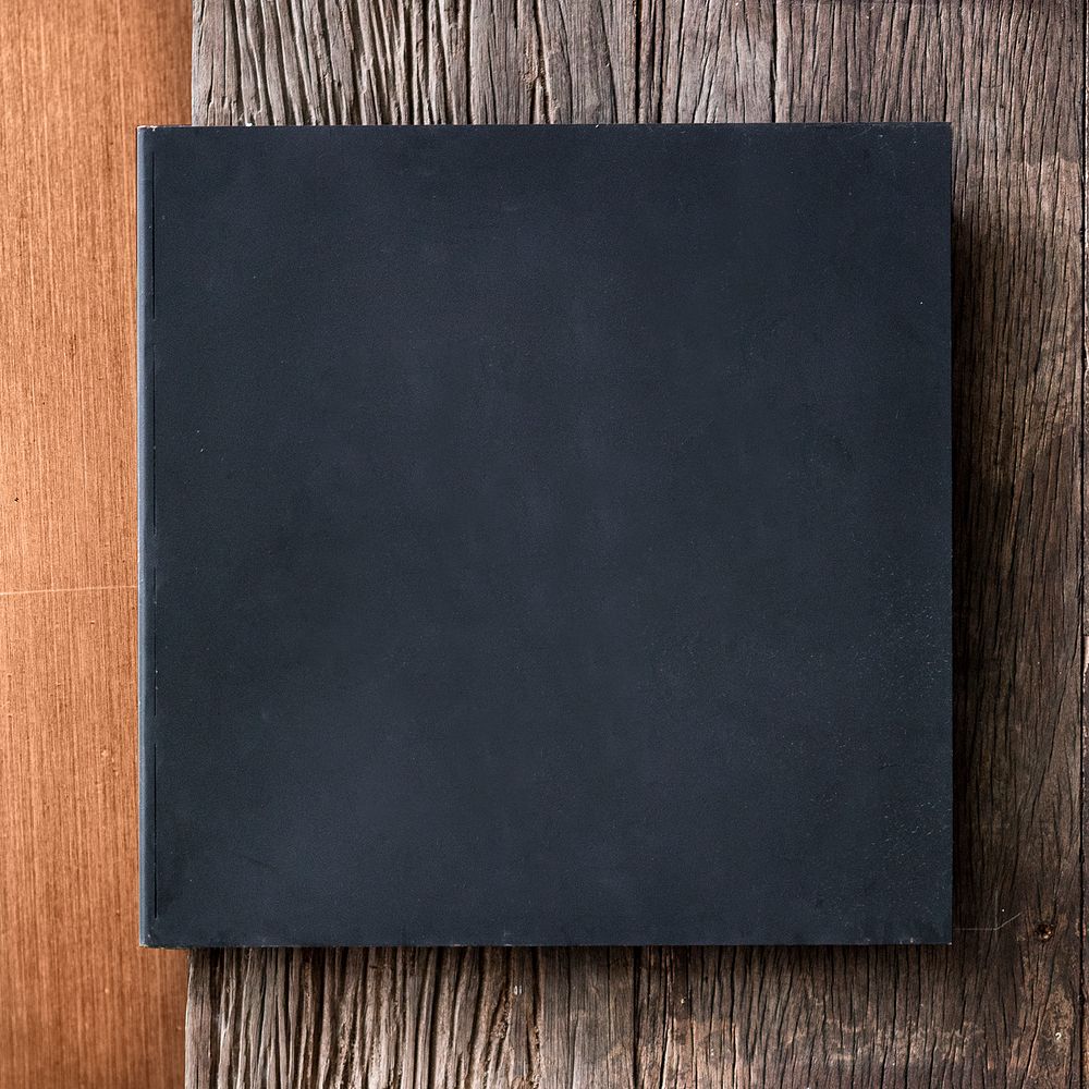 Black frame on wooden background vector